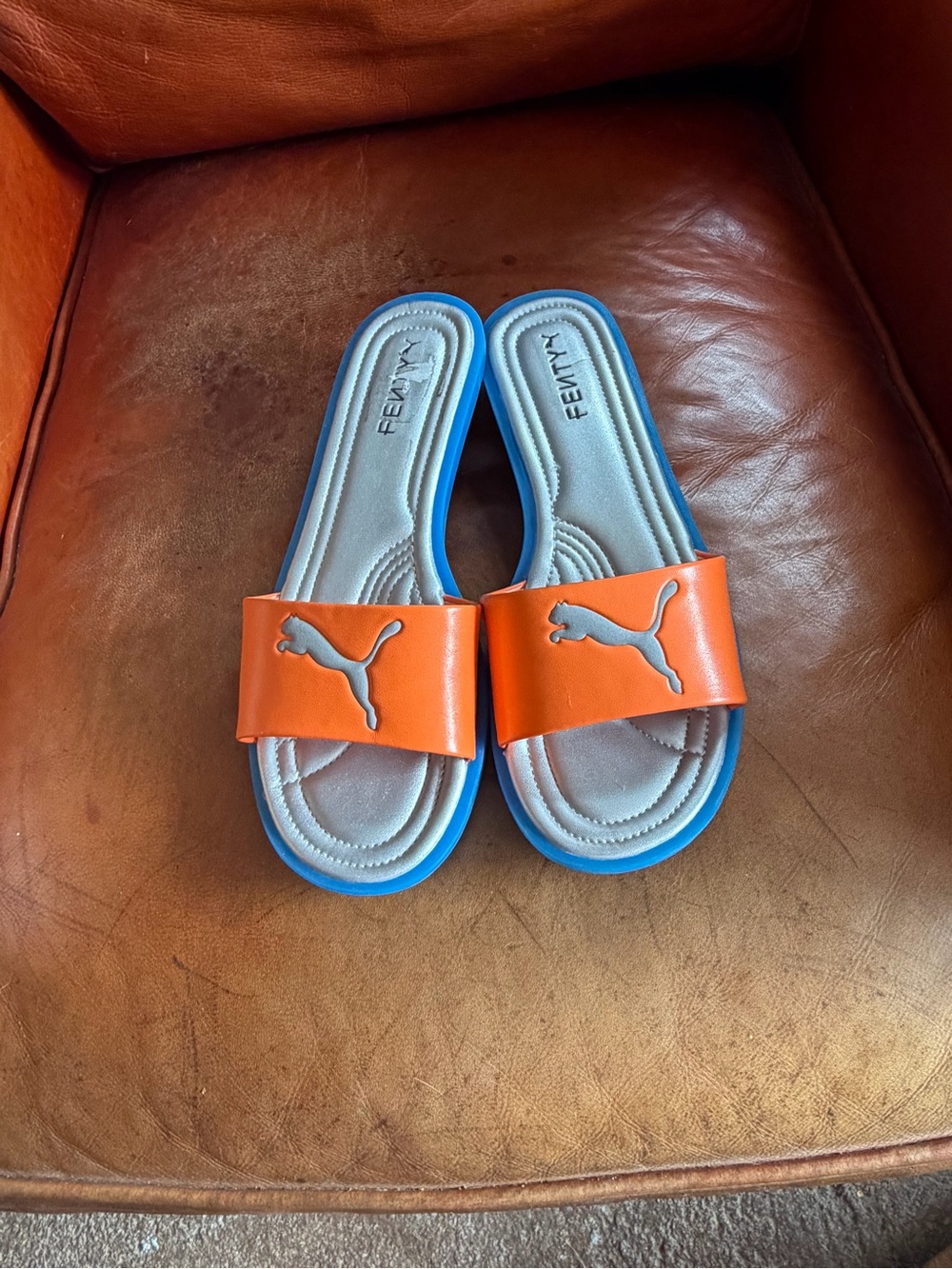 Puma Orange Slide Sandals with Blue Soles